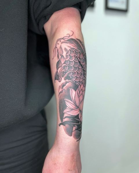 Black and grey koi and lotus forearm piece